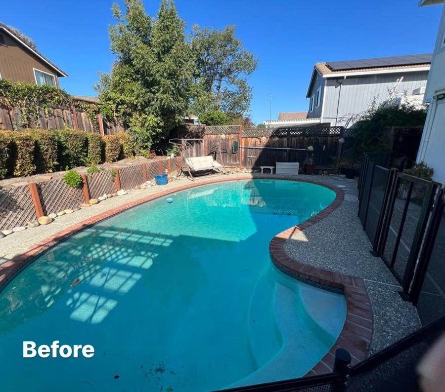 Backyard in-ground pool with brick coping before removal by Royal Demolition